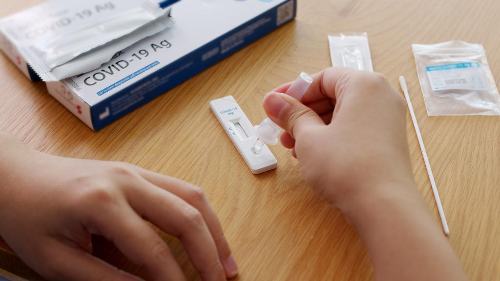 user conducting at-home COVID-19 test