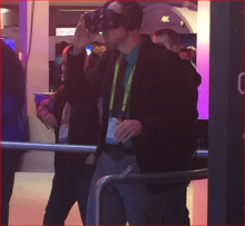 Image of CACP Researcher Nathan Moon wearing a VR headset at CES 2017